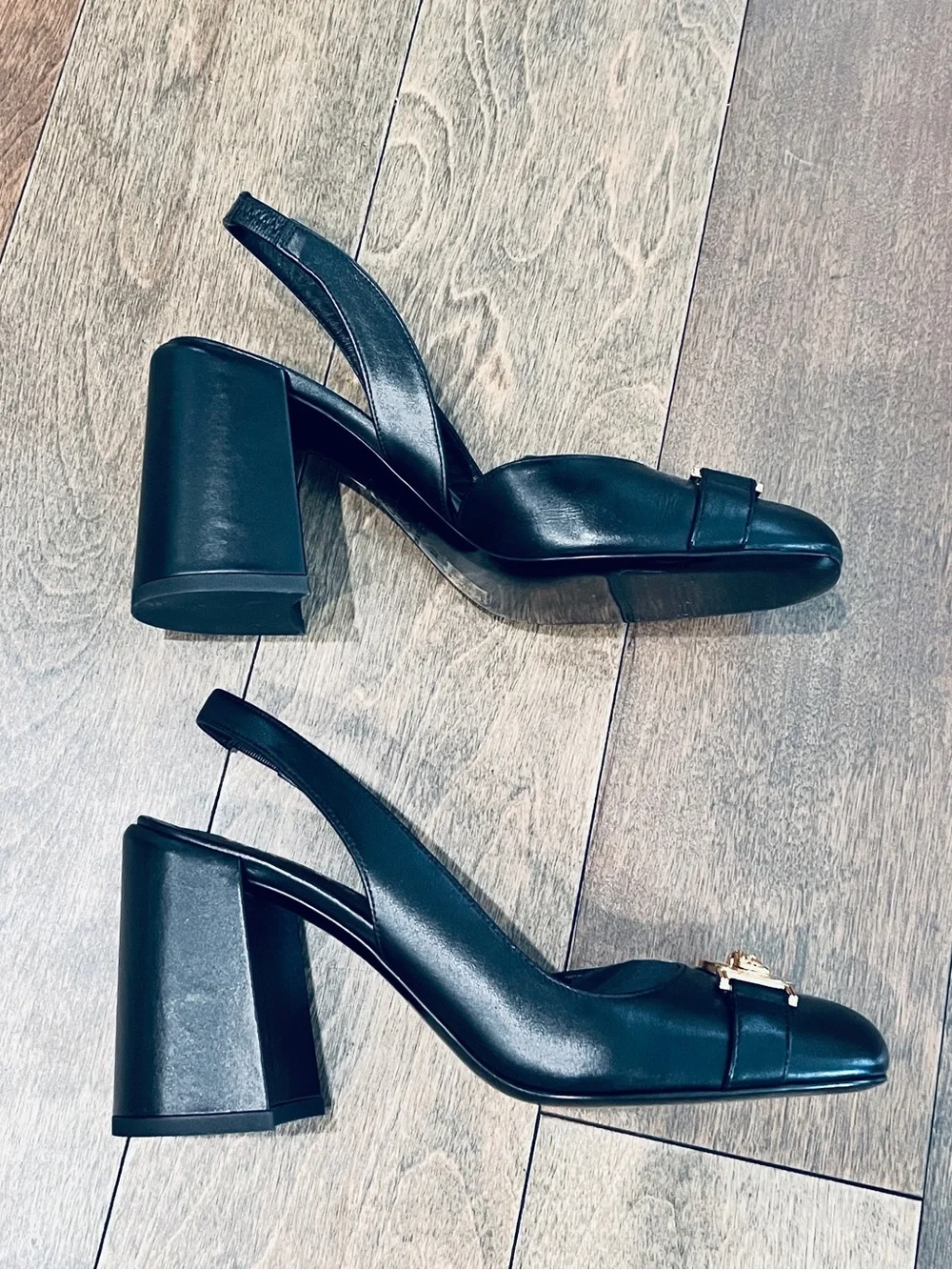 Classic Versace Black Leather Slingback Heels with Gold Medallion Accent